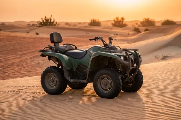 Double-seater quad setup in warm desert light